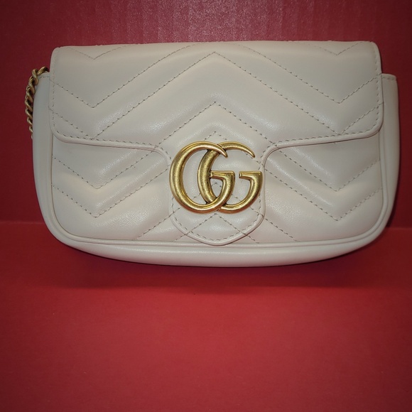 Gucci - Picture 1 of 2